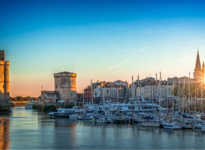 panorama-of-the-old-harbor-of-la-rochelle-france-at-sunset-picture-id1156461621